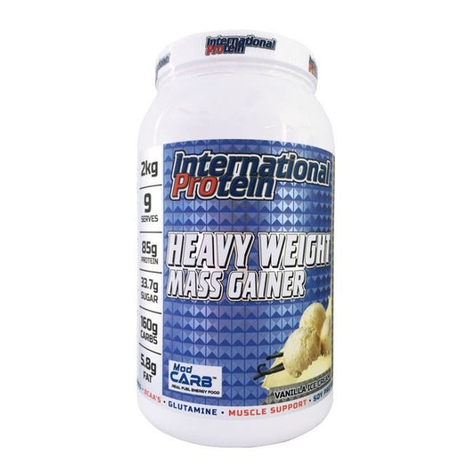 A container of International Protein Heavy Weight Mass Gainer, with a blue label featuring product information.