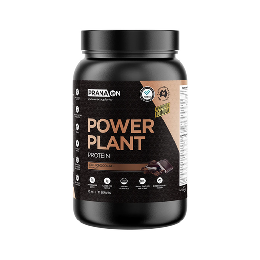 A black jar of Prana On Power Plant Protein powder with the label showing the brand name, product name, and additional information such as '32g protein', 'GMO', and 'no fillers'.